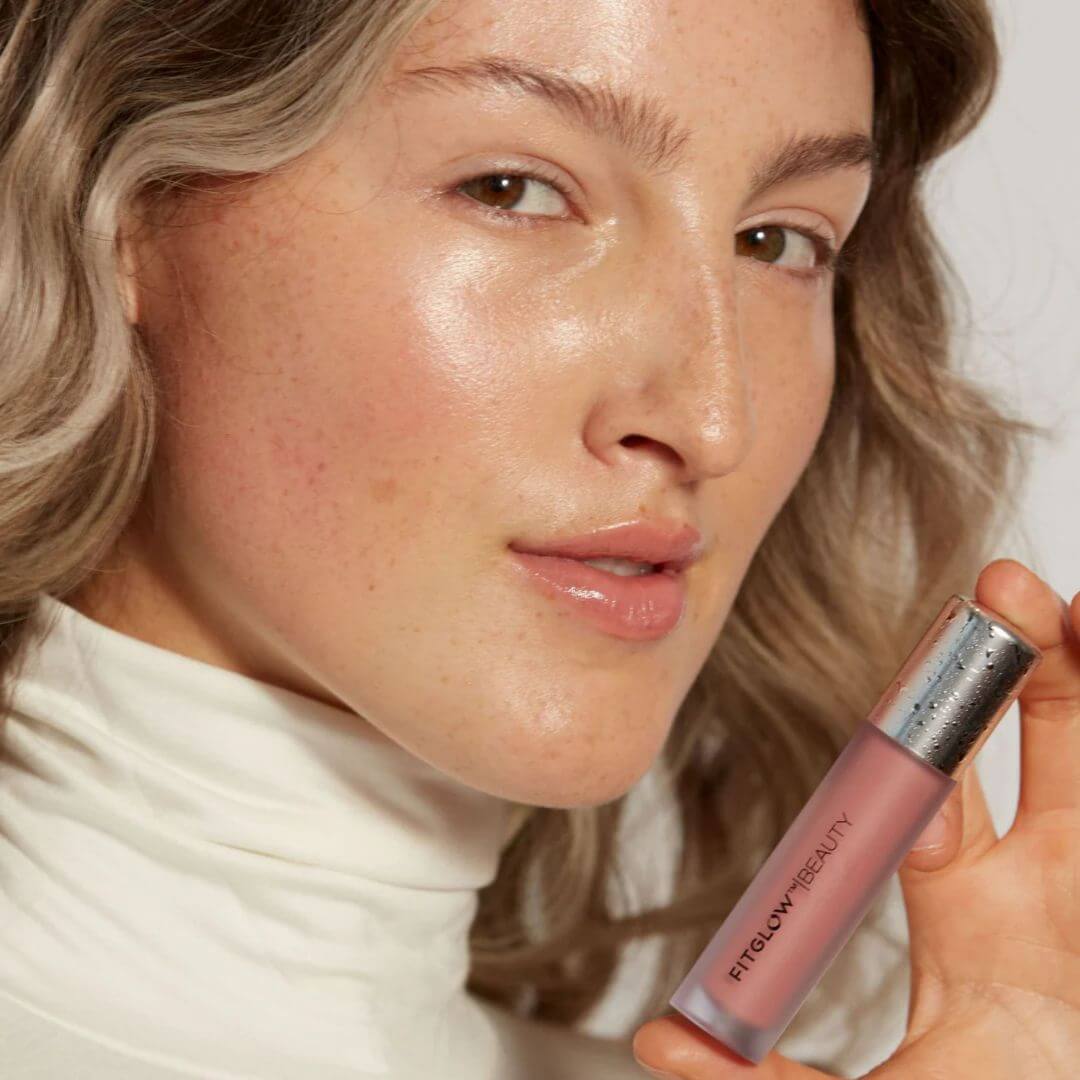 Fitglow pink lip gloss on model