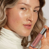 Fitglow pink lip gloss on model