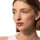 Fitglow sheer berry lip gloss on model