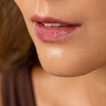 Fitglow bloom lip serum on model