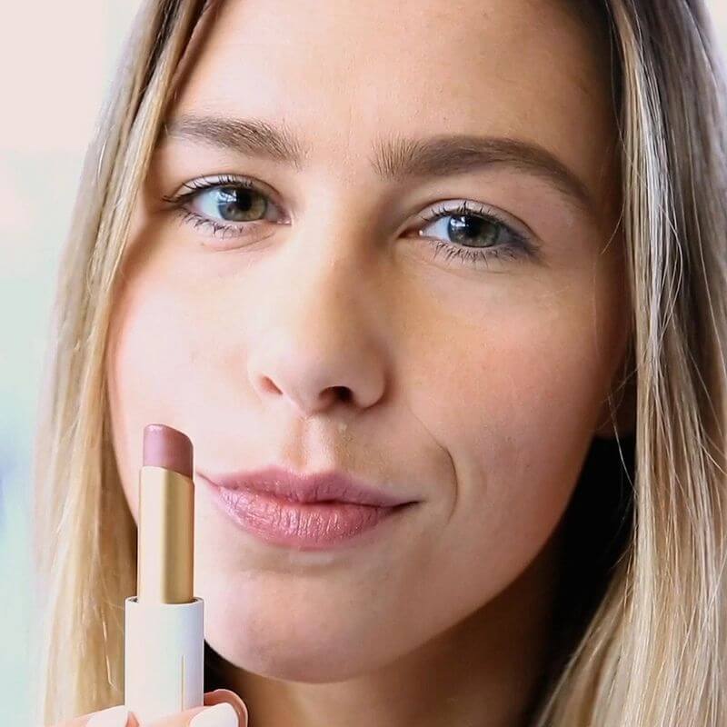 model wearing dusky rose lipstick