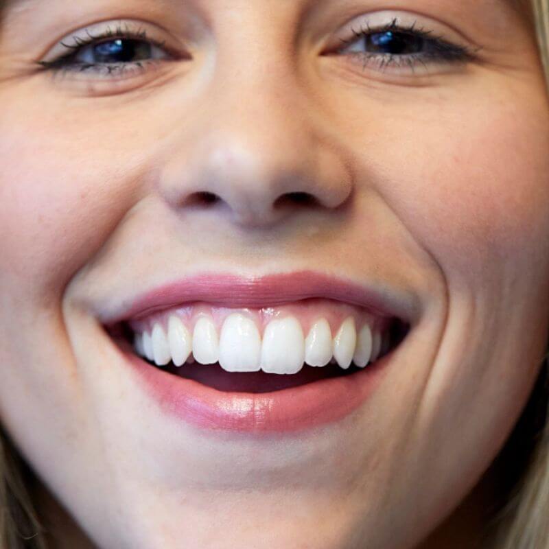 model wearing nude pink lipstick