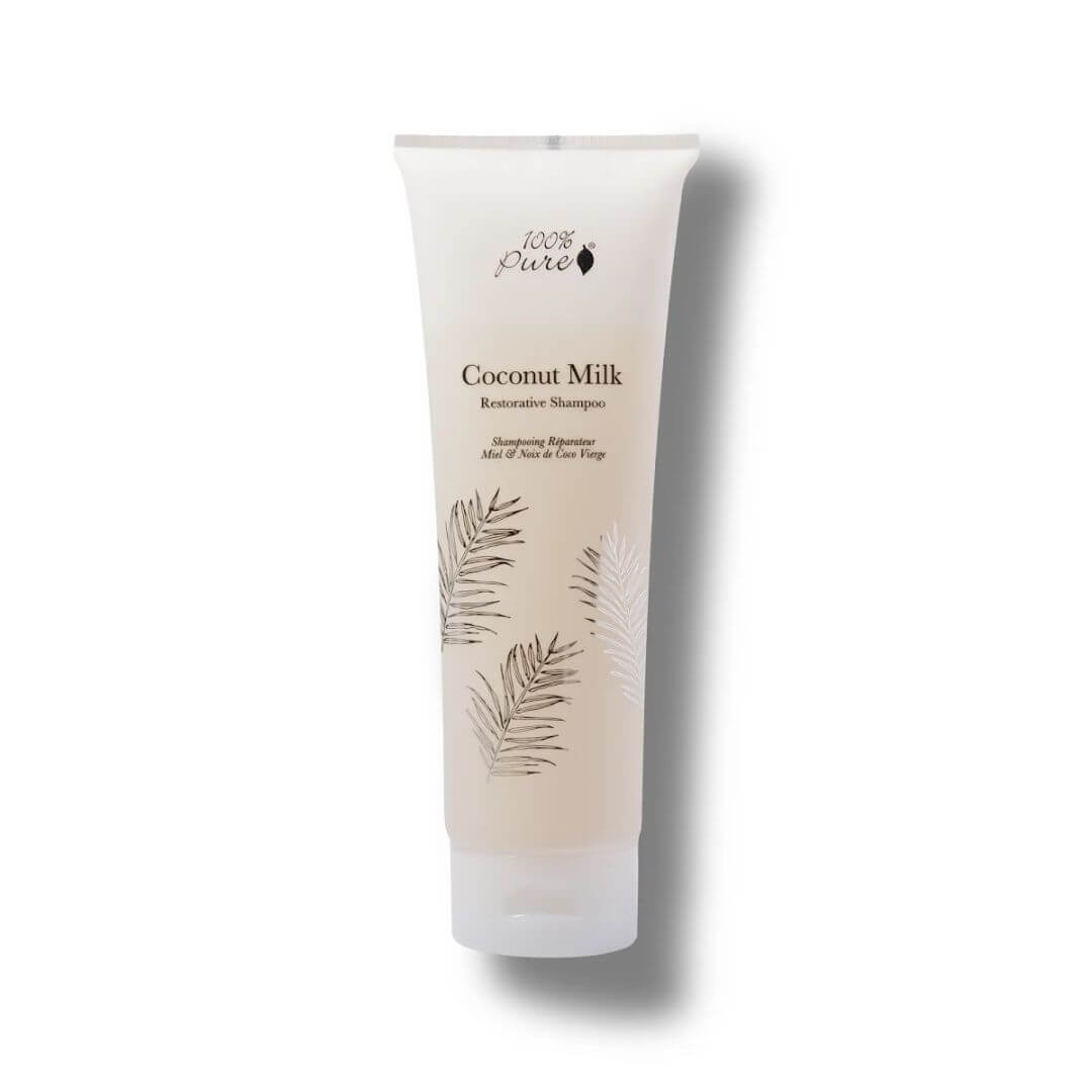 Tube of 100% Pure coconut milk shampoo on a white background