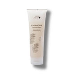 Tube of 100% Pure coconut milk shampoo on a white background