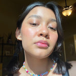 Close-up of a person wearing Axiology Humble Tinted Dew