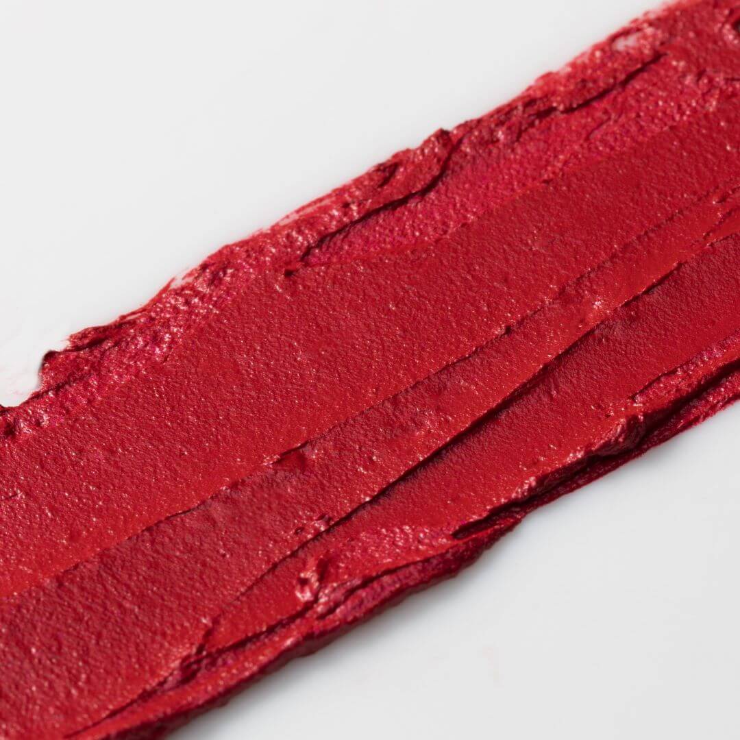 Close-up of Axiology Multi-stick in shade Attitude swatch on a white background