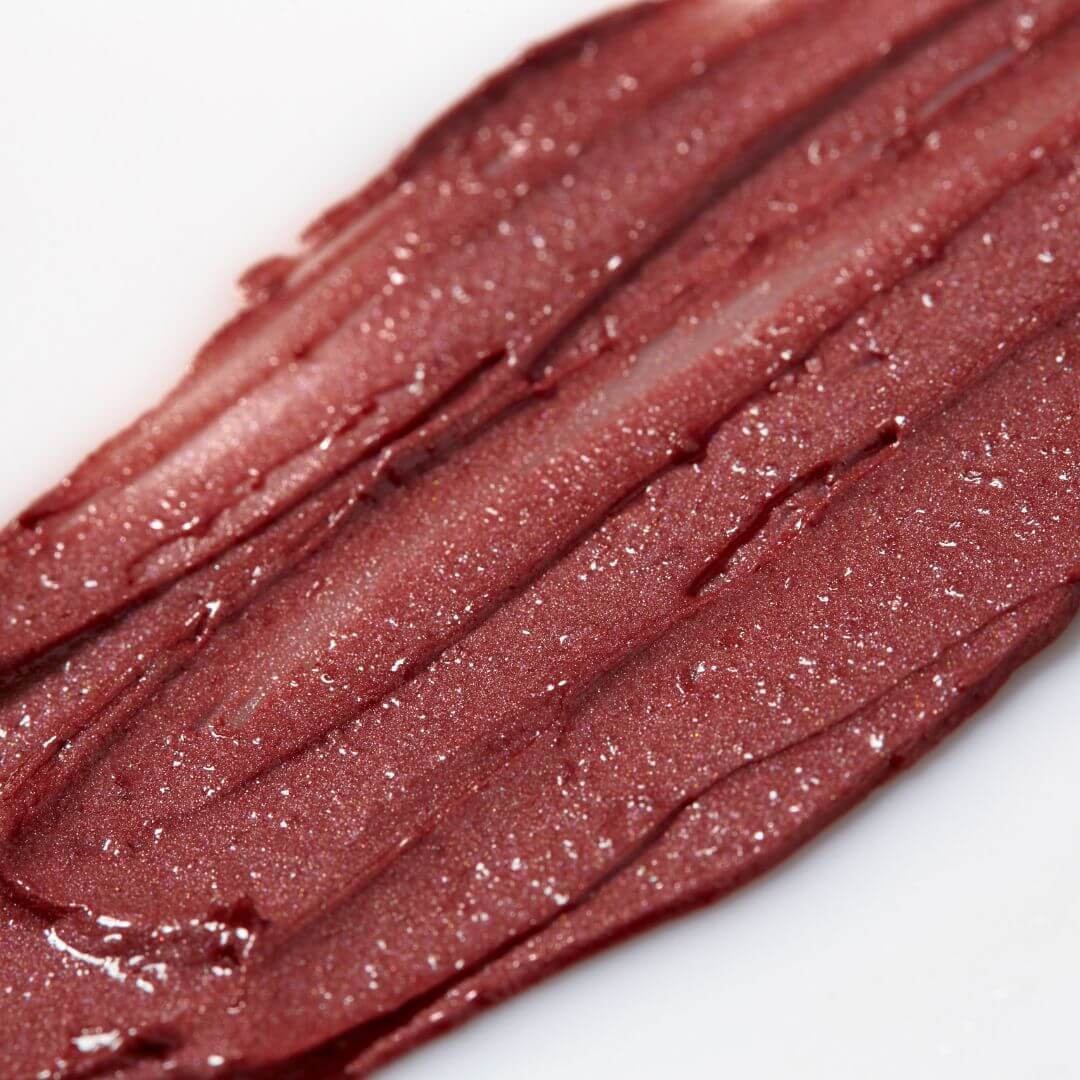 Close-up of a swatch of Axiology The Goodness on a white background