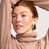 Woman wearing Fitglow Lip Serum in Be