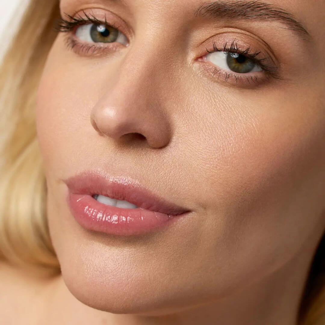 Kari Gran Peppermint blush Lip Balm close up on model