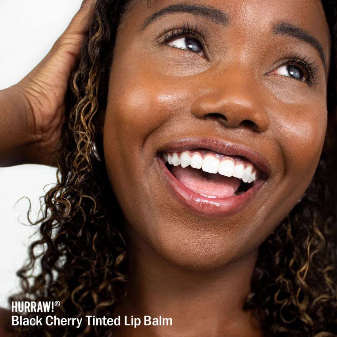 Hurraw Black Cherry Tinted Lip Balm on model