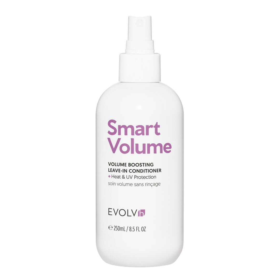 A white bottle of EVOLVH Smart Volume Volume Boosting Leave-In Conditioner with a spray nozzle, featuring purple and black text on a clean white background.
