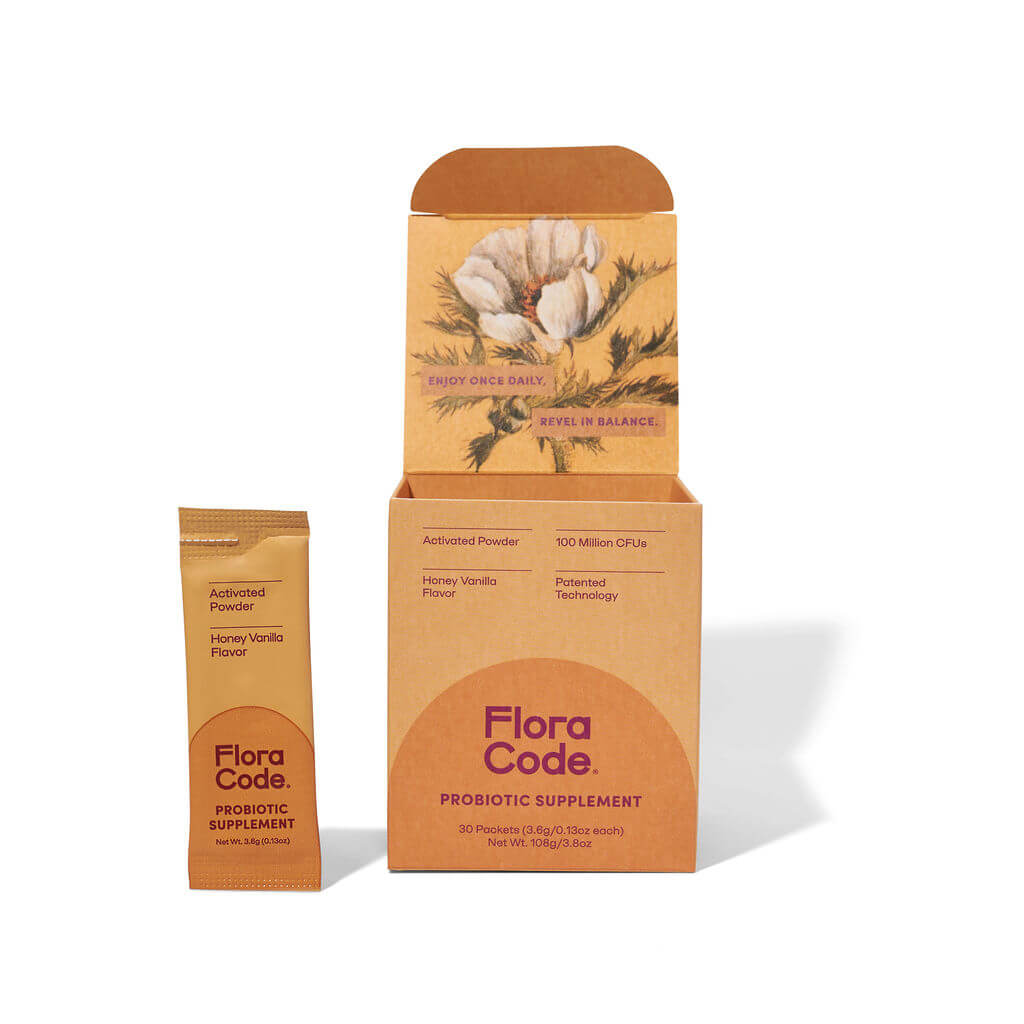 Flora Code probiotic supplement packaging on a white background