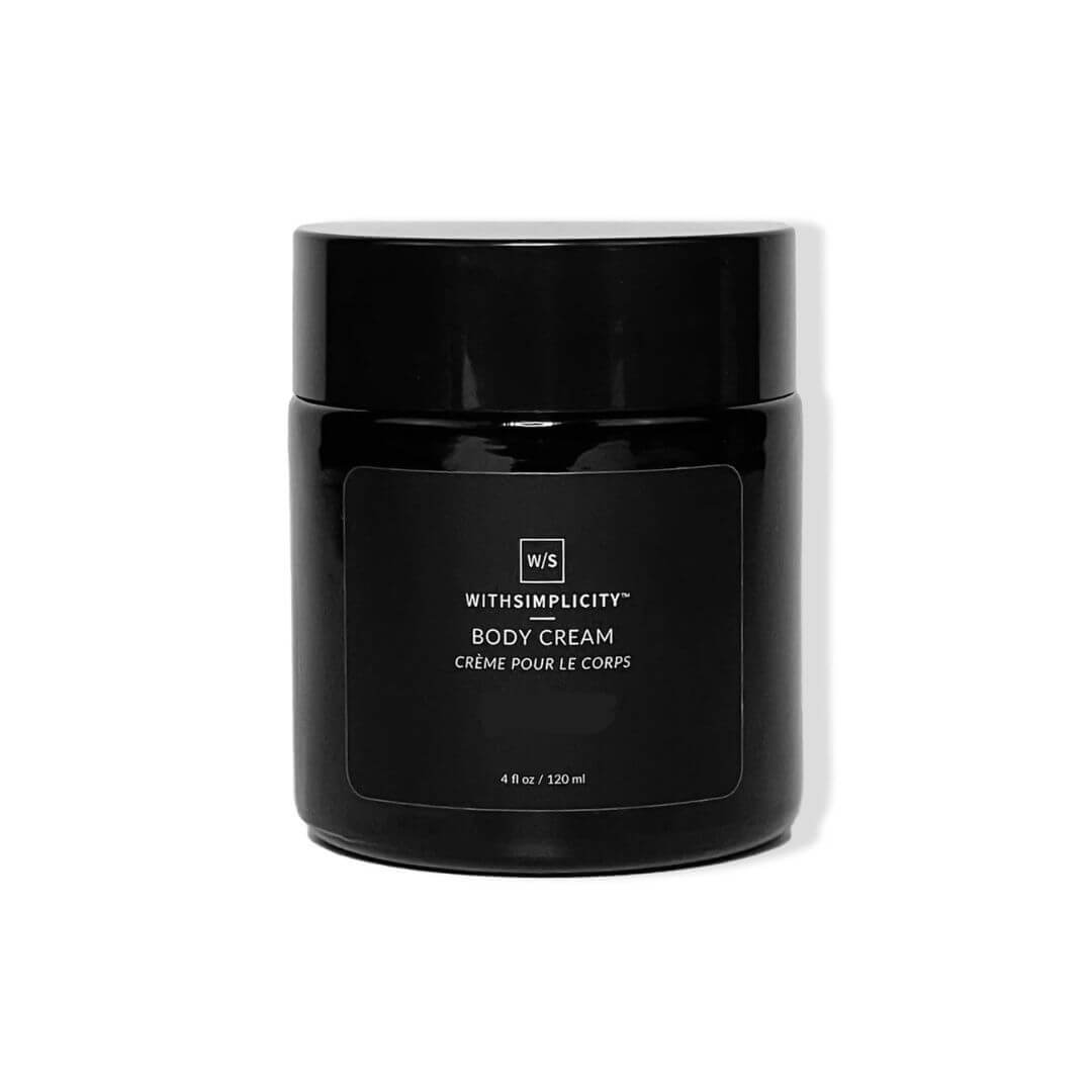 Black body cream jar with 'With Simplicity' branding on a white background
