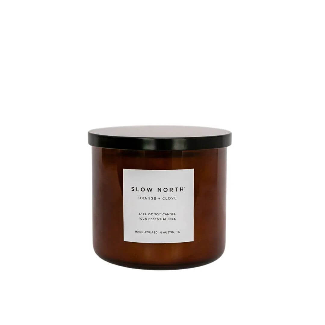 slow north 3 wick candle with black metal lid