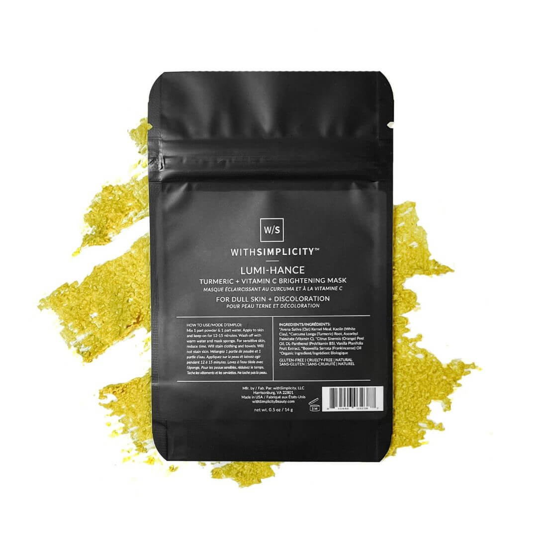 With Simplicity Lumi-Hance Turmeric Vitamin C Brightening Mask with texture on a white background